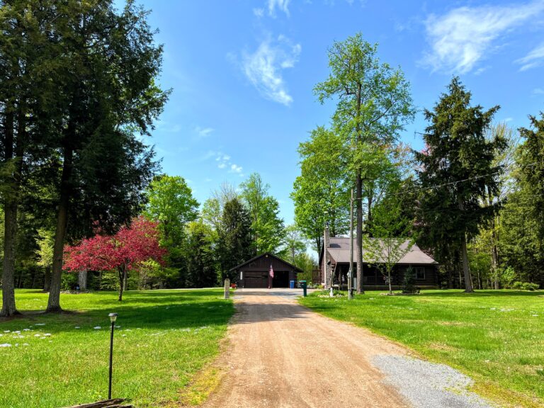 8 acres with Riverfront Log Home Harrisville NY